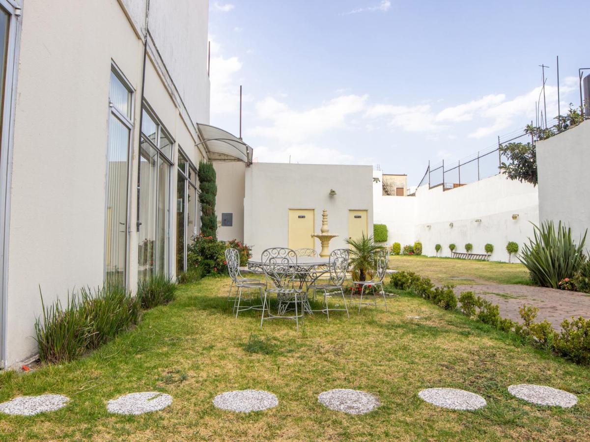 Capital O Hotel Villa Monini Puebla Exterior photo
